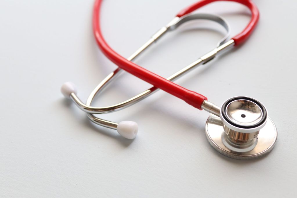 stethoscope on white surface